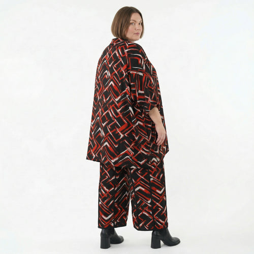 Gerade Jacquardhose in Schwarz Rot Weiß mit Pinselstrichmuster Jerseybiesen und Stretch