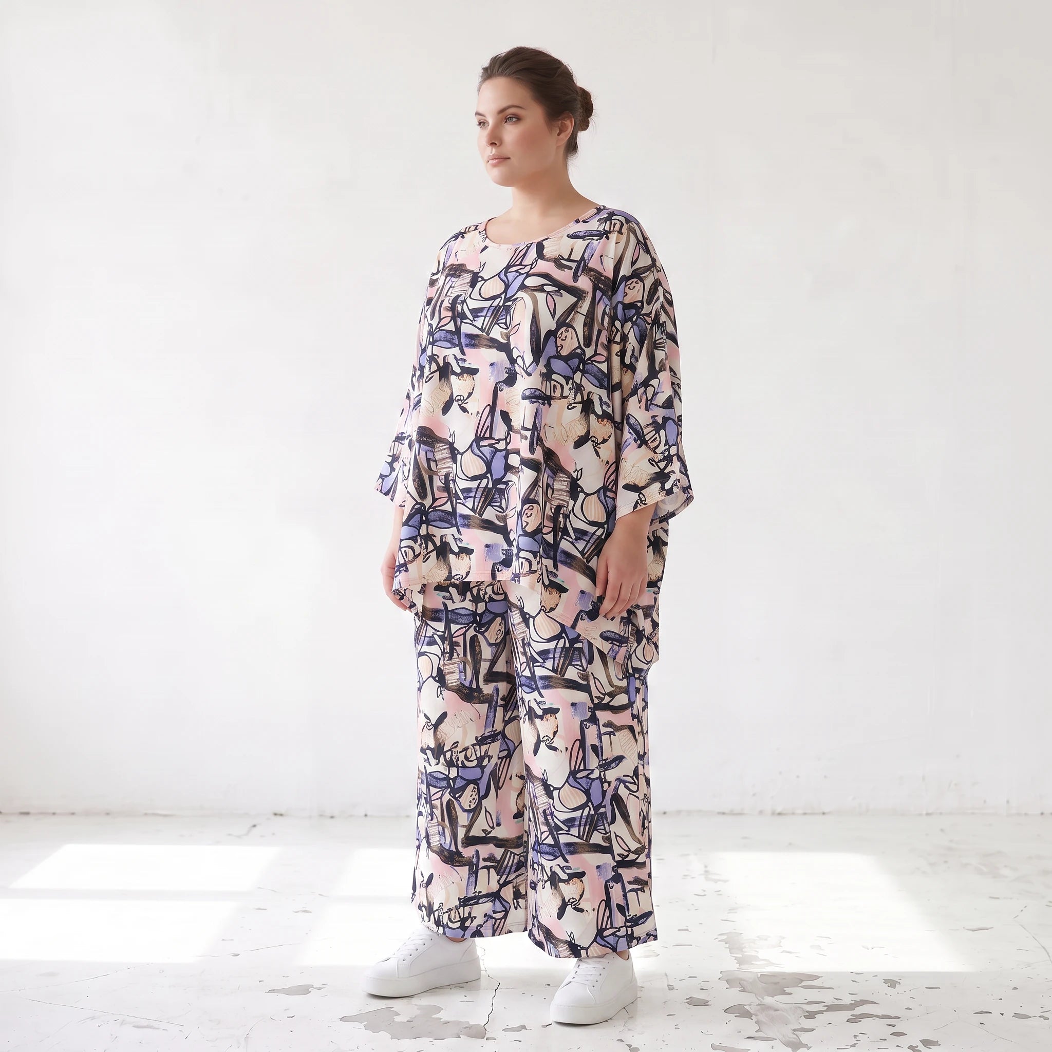 Oversized Shirt aus leichter Viskose Popeline in zartem Rosa mit asymmetrischem Schnitt