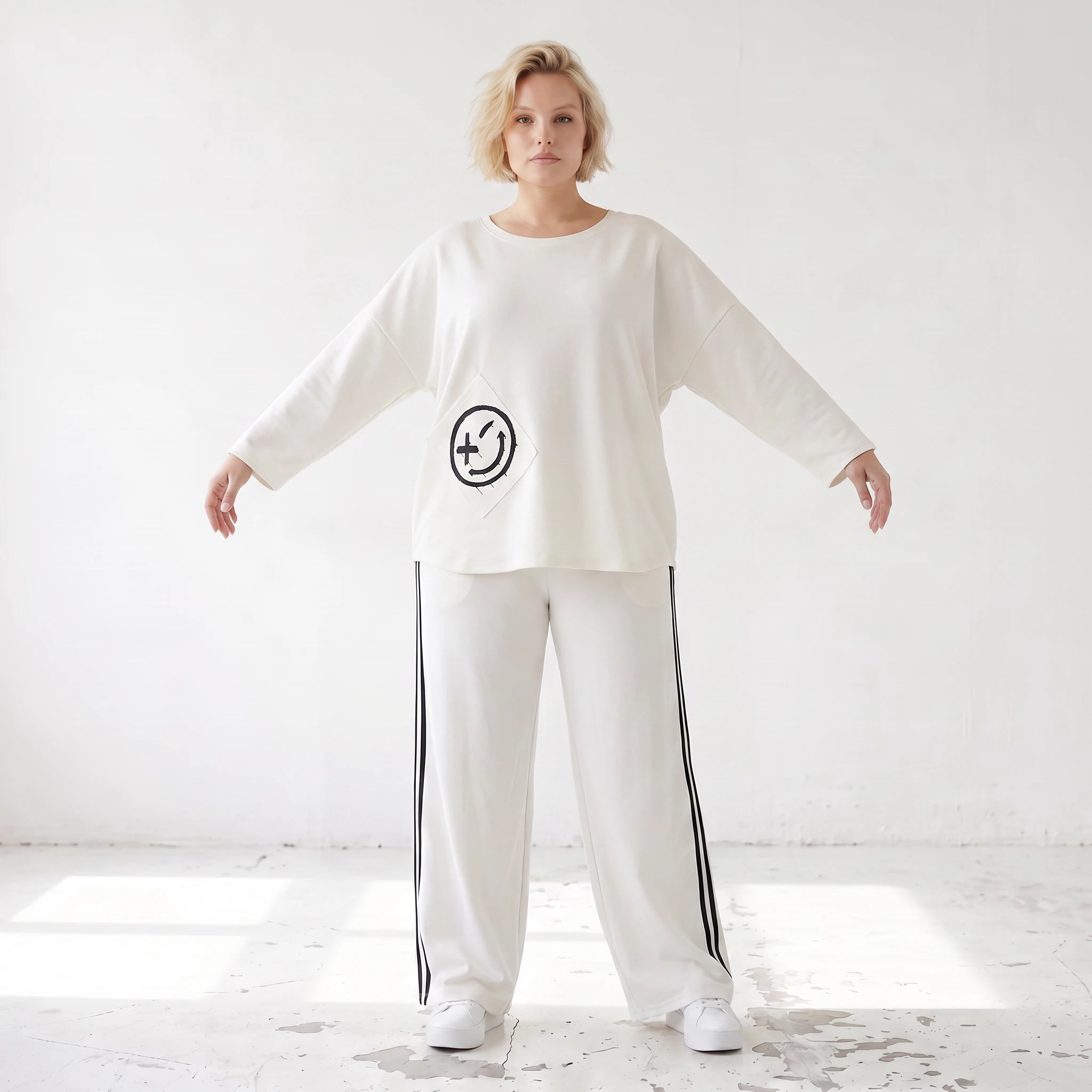 Ballonhose aus French Terry im College Look mit Kontraststreifen und Seitentaschen