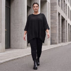 Warmes schwarzes Strickshirt in A-Linie mit Stretch und Destroyedoptik für Winterlooks