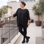 Warmes schwarzes Strickshirt in A-Linie mit Stretch und Destroyedoptik für Winterlooks