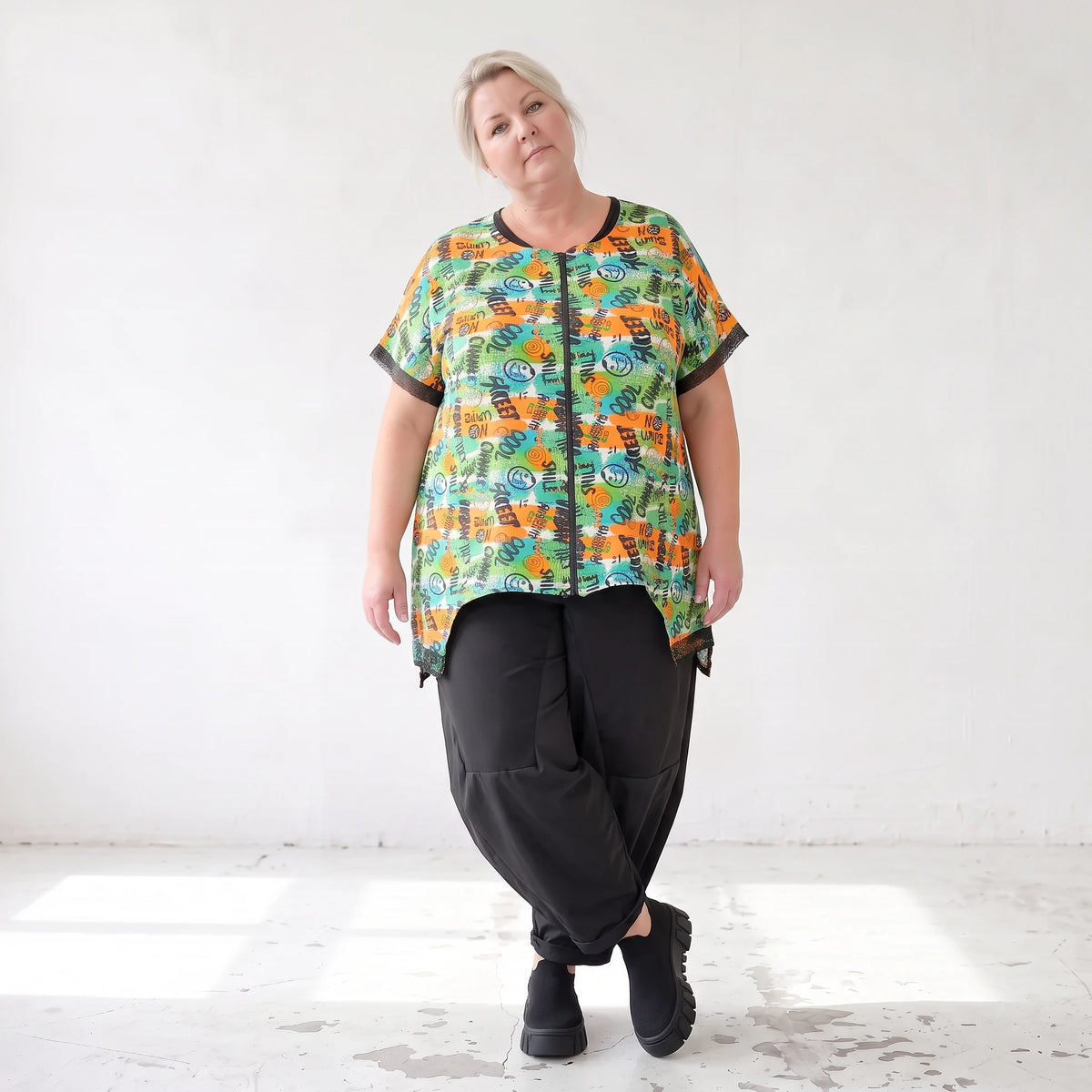 Vokuhilaweste aus softem Stretchjersey mit Netzdetail und lockerem Schnitt modern chic