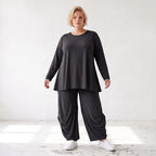 Schwarzes Langarmshirt aus Slinky in Glockenform mit Rundhalsausschnitt elastisch Basic