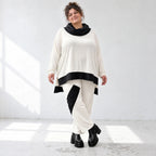 Rollkragenshirt aus fließendem Jersey mit Stretch Vokuhilaform mit seitlichen Schlitzen