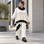 Rollkragenshirt aus fließendem Jersey mit Stretch Vokuhilaform mit seitlichen Schlitzen