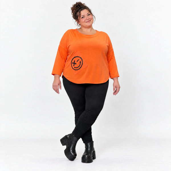 Shirt in Orange mit Rundhalsausschnitt 7/8-Arm und aufgesetzten Taschen aus Stretchjersey