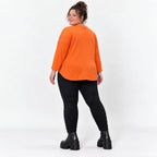 Shirt in Orange mit Rundhalsausschnitt 7/8-Arm und aufgesetzten Taschen aus Stretchjersey