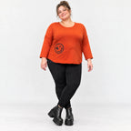 Shirt in Orange aus weichem Stretchjersey mit gerundetem Saum und aufgesetzten Taschen