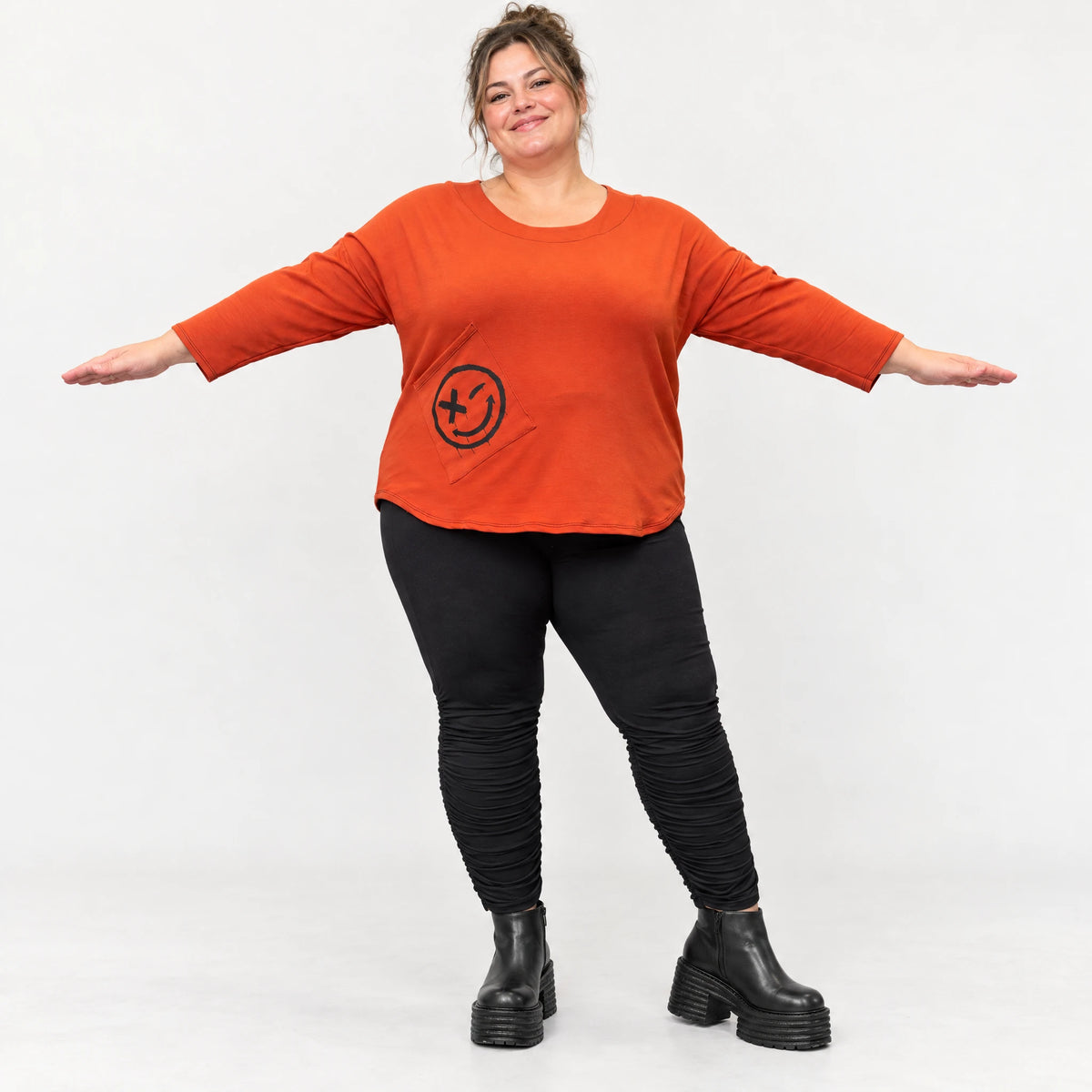 Shirt in Orange aus weichem Stretchjersey mit gerundetem Saum und aufgesetzten Taschen