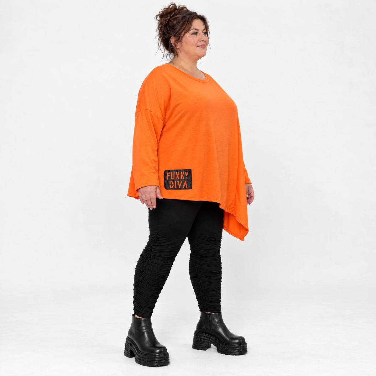 Orange Langarmshirt aus weichem Stretchjersey mit asymmetrischem Schnitt und Zipfelsaum