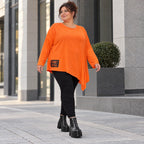 Orange Langarmshirt aus weichem Stretchjersey mit asymmetrischem Schnitt und Zipfelsaum