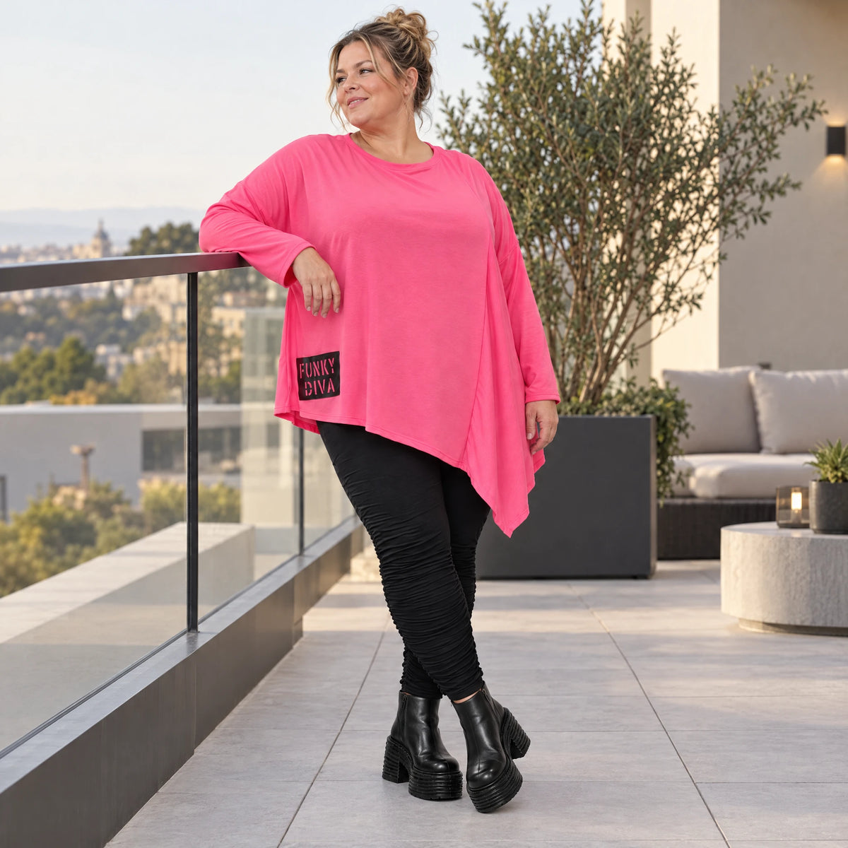 Langarmshirt in frischem Pink mit asymmetrischem Zipfelsaum aus weichem Stretchjersey
