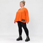 Langarmshirt in kräftigem Orange mit lässig kastigem Schnitt aus weichem Baumwolljersey
