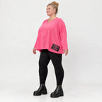 Langarmshirt in Pink aus weichem Stretchjersey mit V-Ausschnitt und kastiger Silhouette