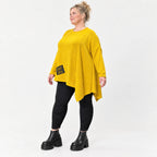 Feinstrickshirt in Gelb mit asymmetrischem Zipfelsaum Langarm und Rundhalsausschnitt