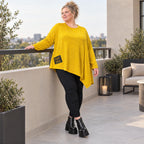 Feinstrickshirt in Gelb mit asymmetrischem Zipfelsaum Langarm und Rundhalsausschnitt