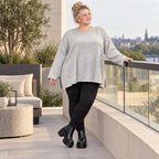 Kuscheliges Feinstrickshirt in Grau/Schwarz Melange mit fließender A-Linie aus Italien