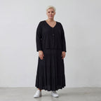 Leichte Jersey Jacke in tiefem Schwarz mit asymmetrischem Schnitt und weichem Tragekomfort