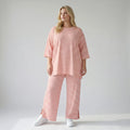 Stilvolle Lagenlook Hose aus weichem Jersey in legerer Oversize Form mit Schlitz, Weiß/Lachs