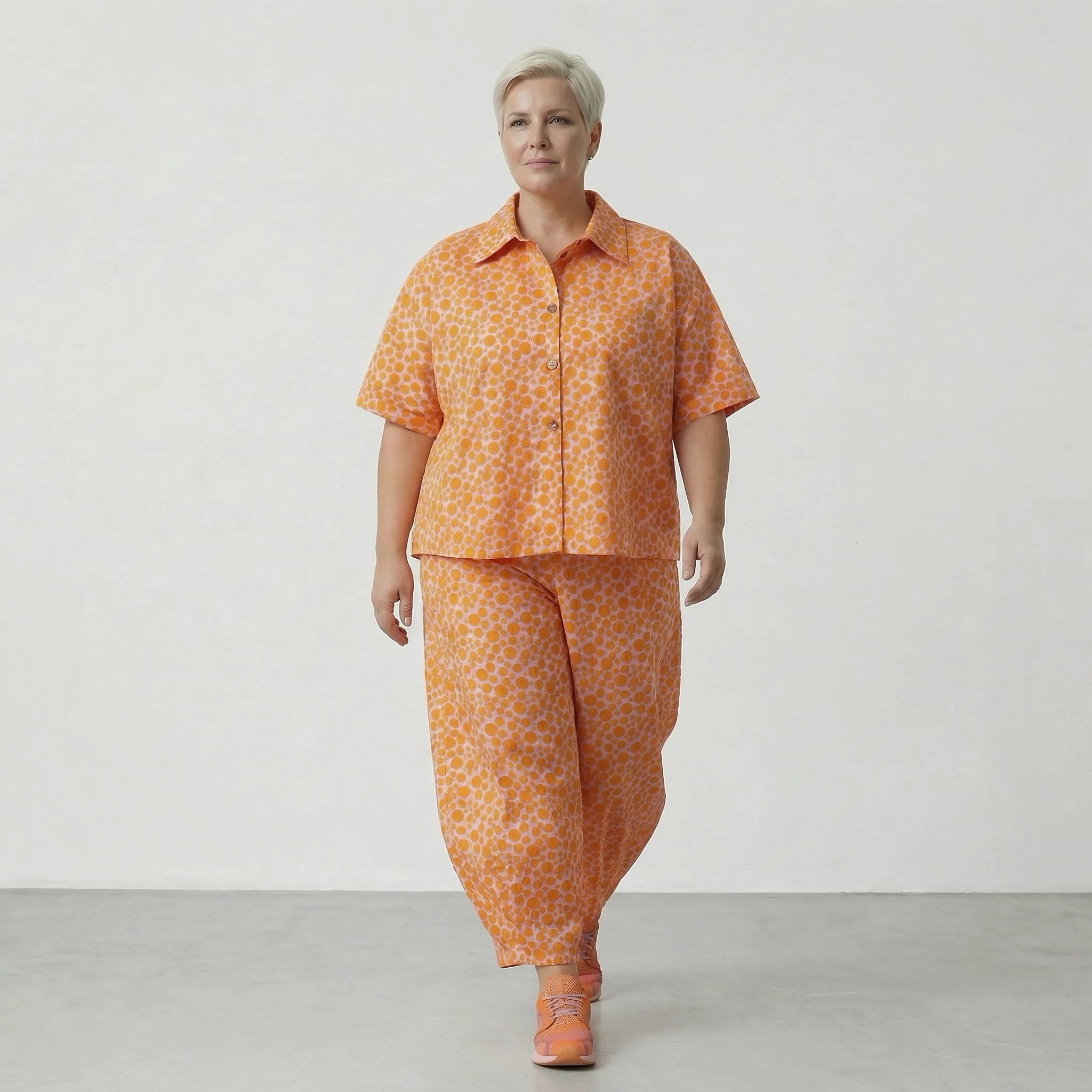 Leichte Ballonhose aus feiner Baumwolle im angesagten Lagenlook mit weiten Beinen und Punkten, Rosa/Orange