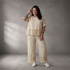 Zeitlose Creme Leinenhose im leger Lagenlook mit Strickdetails und Komfortbund Sommerfit