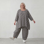 Sommershirt in Leinenoptik mit femininem Dreiviertelarm und Rundhals in Schwarz und Weiß