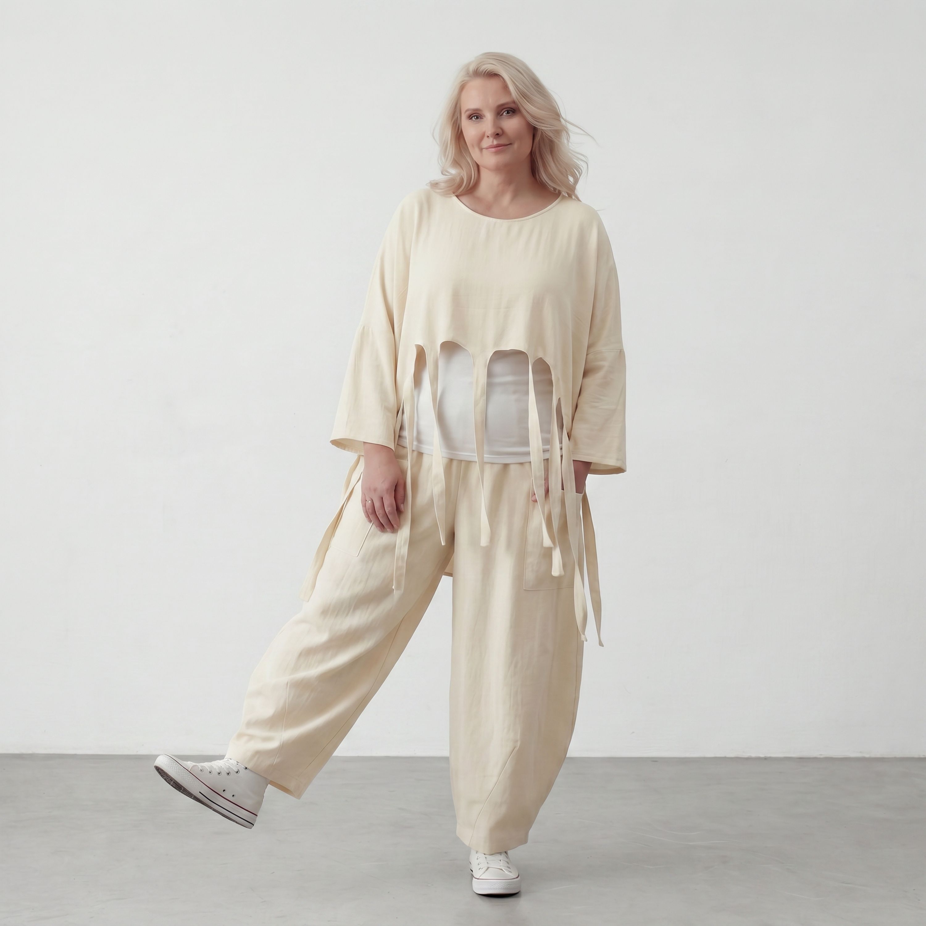 Zeitloser Oversize Lagenlook Überwurf in Creme leger luftig mit Fransen Detail fein soft