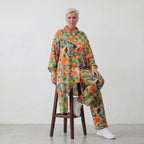 Leichte Bluse in frischem Apfelgrün mit lässigem Zipfelsaum und klassischem Hemdkragen
